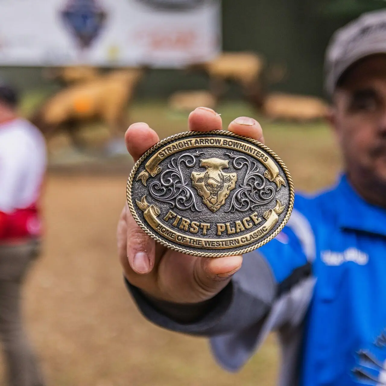 i-GtBNZCP-X5 Mark Rubio holding up his belt buckle award